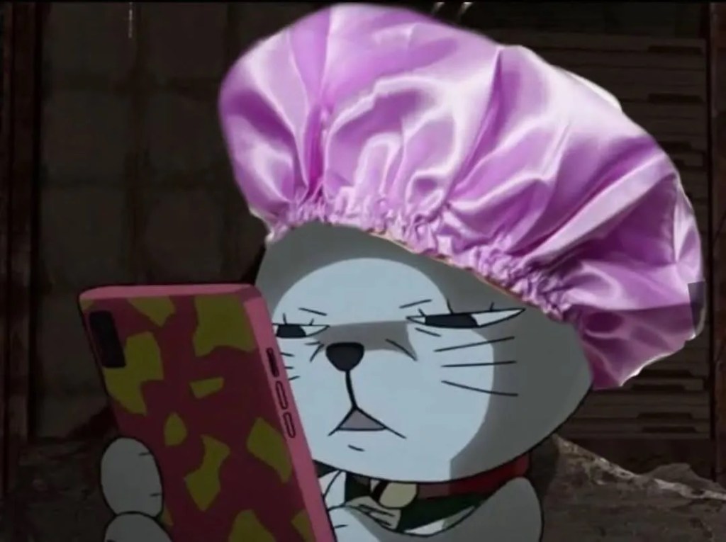 Turbo Granny (Dandadan) in cat form, in a bonnet, looking at a phone screen in the dark.